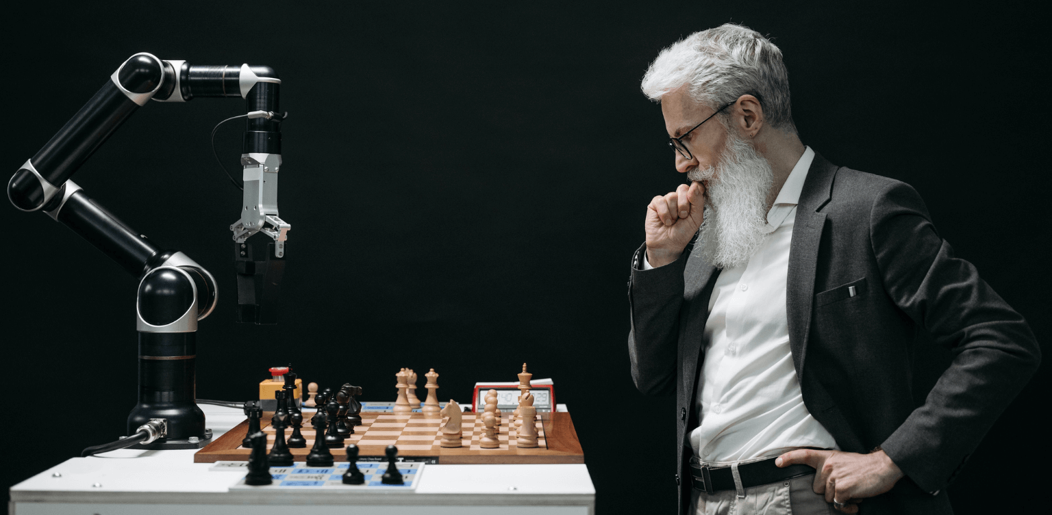 Man playing chess against AI. STEM market opportunities and challenges